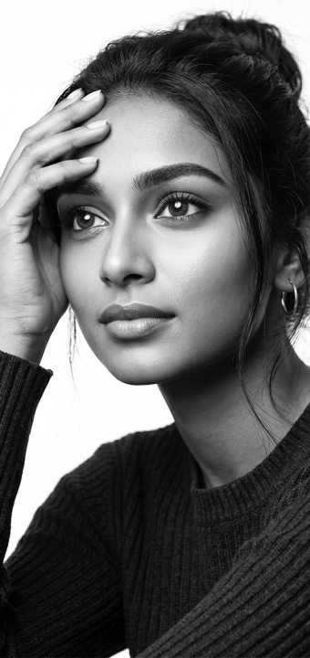 Striking monochrome portrait radiating quiet strength and intimate introspection.